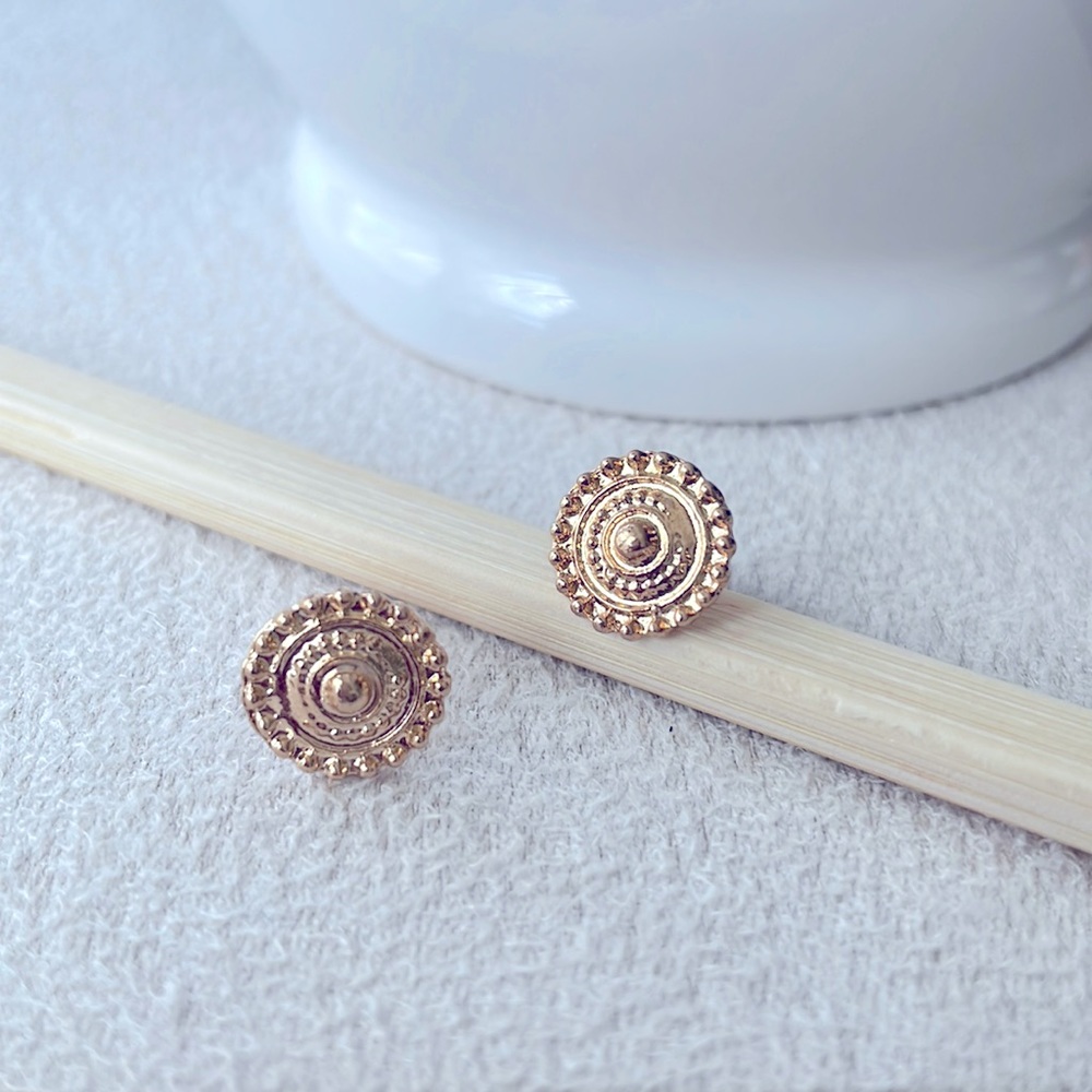 Gold circle stud earrings